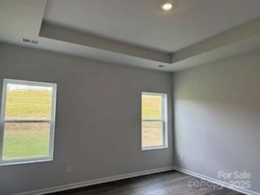 156 Ella Claire Drive, York, SC 29745.  MLS# CAR4270591, YatesRealty ID 20303. Owners bedroom with tray ceiling