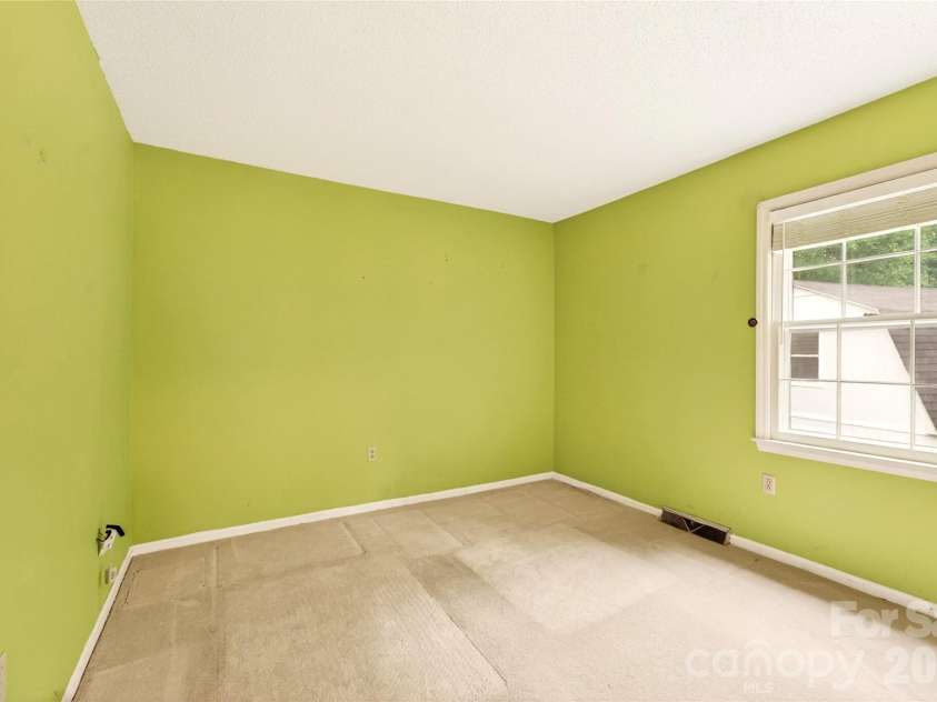621 Winter Wood Drive, Matthews, NC 28105.  MLS# CAR4376332, YatesRealty ID 20308. Bedroom 2