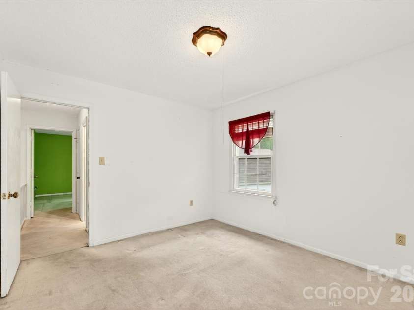 621 Winter Wood Drive, Matthews, NC 28105.  MLS# CAR4376332, YatesRealty ID 20308. Bedroom 3