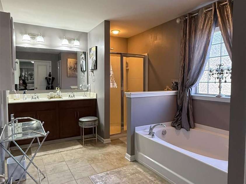7910 Sweet Grove Court, Charlotte, NC 28269.  MLS# CAR4331516, YatesRealty ID 20319. Massive Primary Bathroom