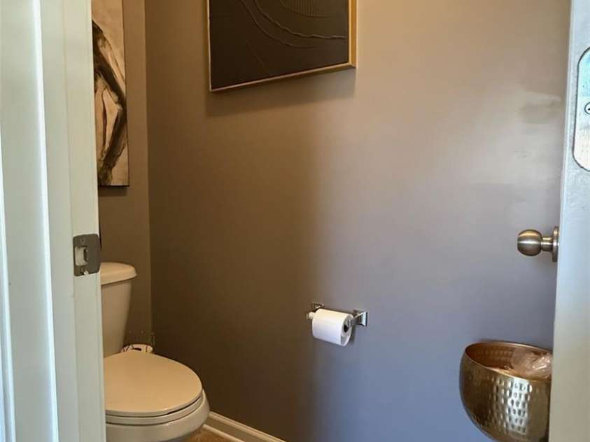 7910 Sweet Grove Court, Charlotte, NC 28269.  MLS# CAR4331516, YatesRealty ID 20319. Primary Water Closet