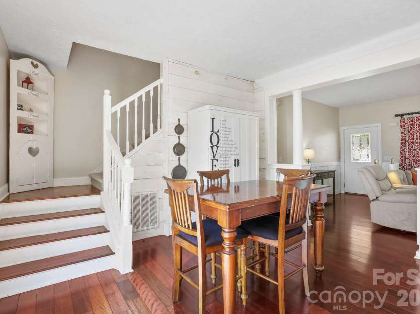 10 Eagle Drive, Hendersonville, NC 28792.  MLS# CAR4365502, YatesRealty ID 20321. Dining room with sliding doors to back deck
