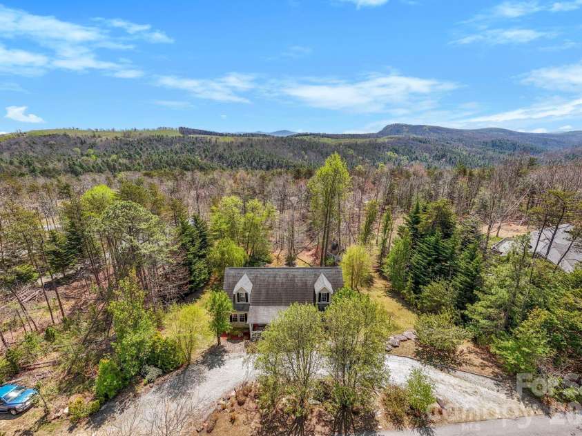 10 Eagle Drive, Hendersonville, NC 28792.  MLS# CAR4365502, YatesRealty ID 20321. Private wooded views