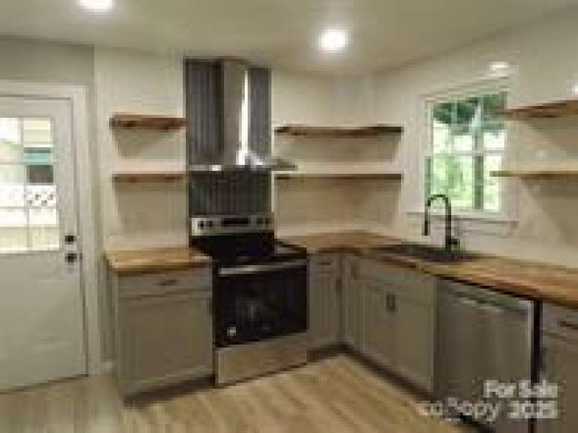 418 Bradley Street, Maggie Valley, NC 28751.  MLS# CAR4263701, YatesRealty ID 20325. 