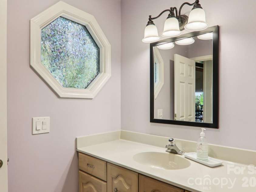 817 Greenwood Drive, Hendersonville, NC 28791.  MLS# CAR4371920, YatesRealty ID 20328. Hall bath
