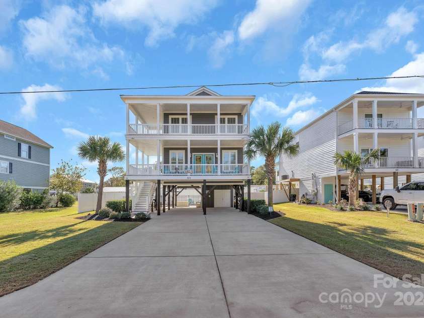 333 Calhoun Drive, Garden City, SC 29576.  MLS# CAR4176788, YatesRealty ID 2033. All immediate neighbors, across the street, behind, and both sides are permanent residents.