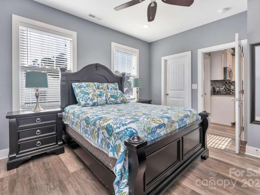 333 Calhoun Drive, Garden City, SC 29576.  MLS# CAR4176788, YatesRealty ID 2033. Queen bedroom on main level with private en suite