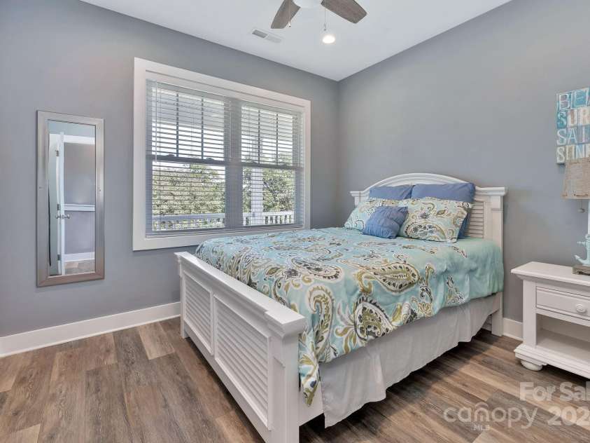 333 Calhoun Drive, Garden City, SC 29576.  MLS# CAR4176788, YatesRealty ID 2033. Queen bedroom upstairs