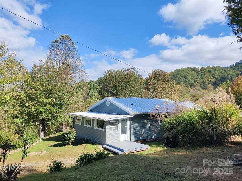 7 and 11 Dalph Drive, Weaverville, NC 28787.  MLS# CAR4315125, YatesRealty ID 2033. Back of the home