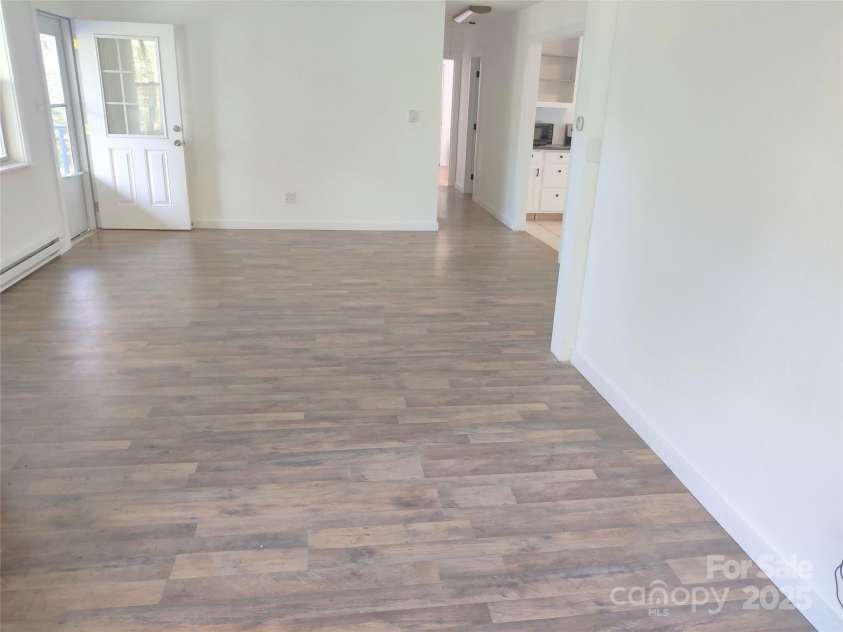 7 and 11 Dalph Drive, Weaverville, NC 28787.  MLS# CAR4315125, YatesRealty ID 2033. Living room from office