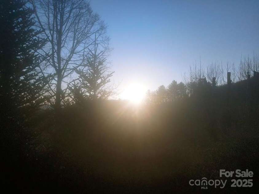 7 and 11 Dalph Drive, Weaverville, NC 28787.  MLS# CAR4315125, YatesRealty ID 2033. Sunrise from front porch