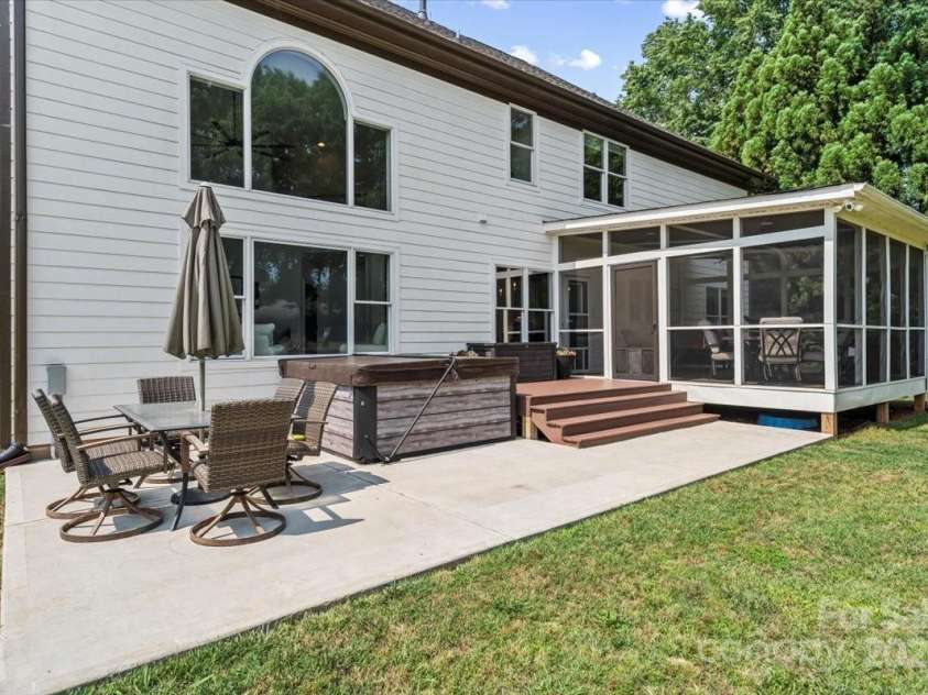 18745 Bluff Point Road, Cornelius, NC 28031.  MLS# CAR4264451, YatesRealty ID 20330. 8 person Viking hot tub and patio added 2023