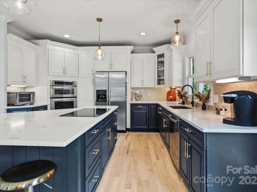 18745 Bluff Point Road, Cornelius, NC 28031.  MLS# CAR4264451, YatesRealty ID 20330. Cooktop is currently electric, but can be easily converted back to gas
