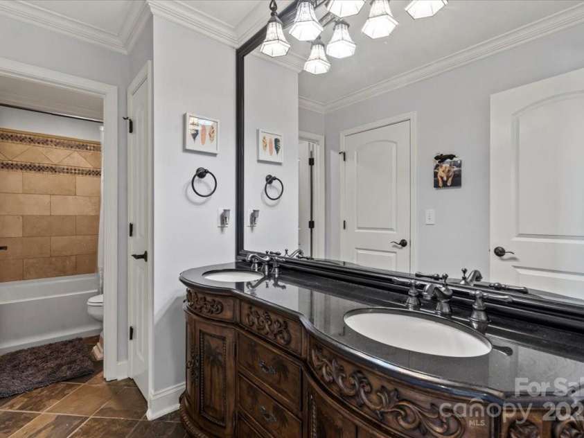 18745 Bluff Point Road, Cornelius, NC 28031.  MLS# CAR4264451, YatesRealty ID 20330. Jack n' jill bathroom