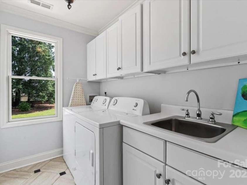 18745 Bluff Point Road, Cornelius, NC 28031.  MLS# CAR4264451, YatesRealty ID 20330. Laundry room 2 floor