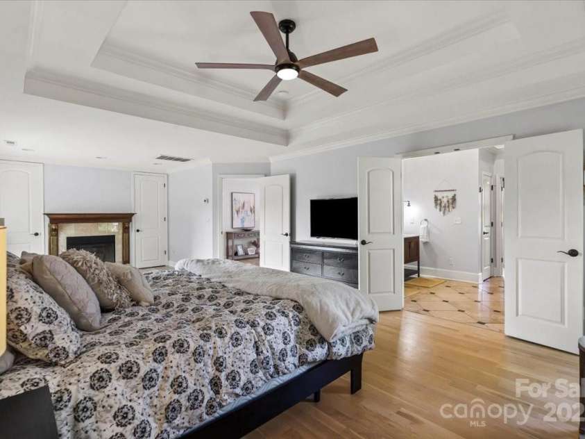 18745 Bluff Point Road, Cornelius, NC 28031.  MLS# CAR4264451, YatesRealty ID 20330. Primary has sitting area with fireplace