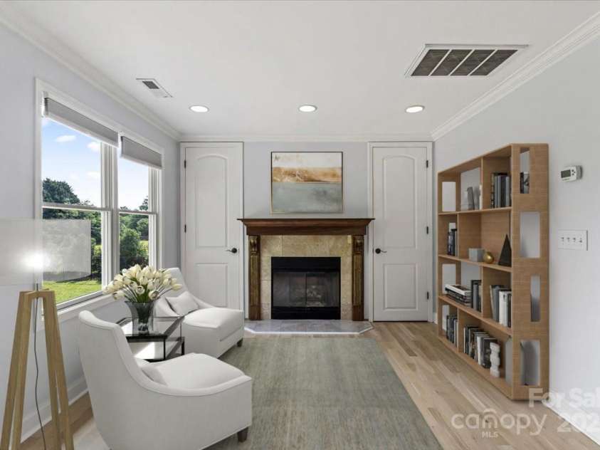 18745 Bluff Point Road, Cornelius, NC 28031.  MLS# CAR4264451, YatesRealty ID 20330. Sitting area in primary bedroom virtually staged