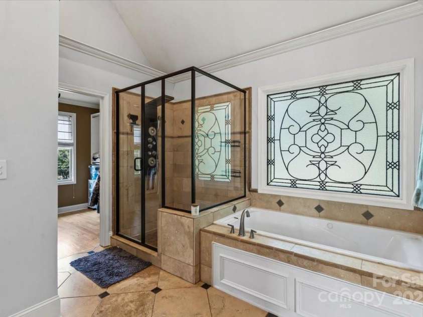 18745 Bluff Point Road, Cornelius, NC 28031.  MLS# CAR4264451, YatesRealty ID 20330. Spa tub--never used