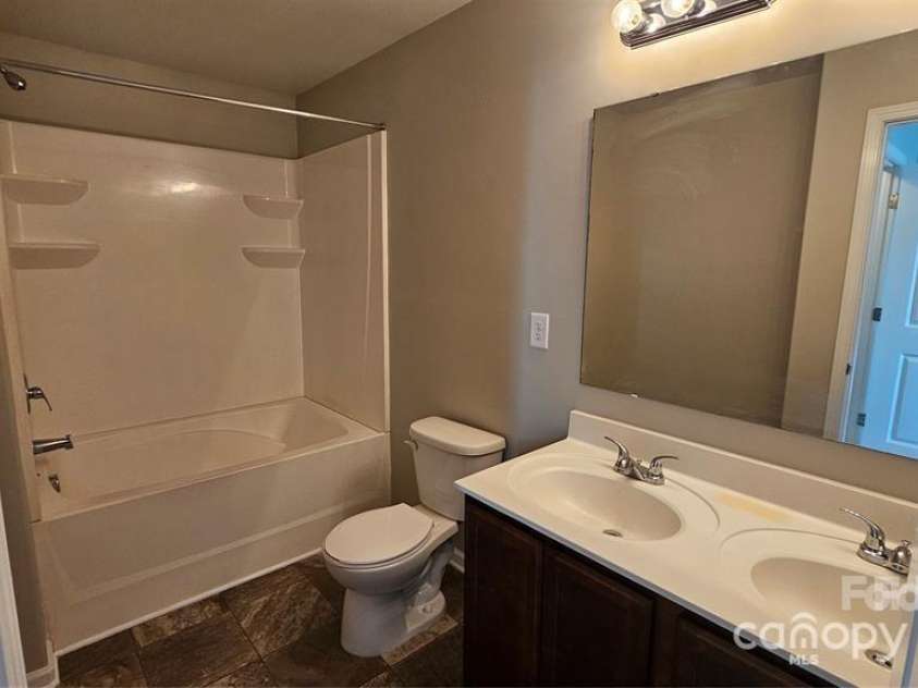 5823 Natick Drive, Charlotte, NC 28214.  MLS# CAR4257135, YatesRealty ID 20334. Primary Bathroom