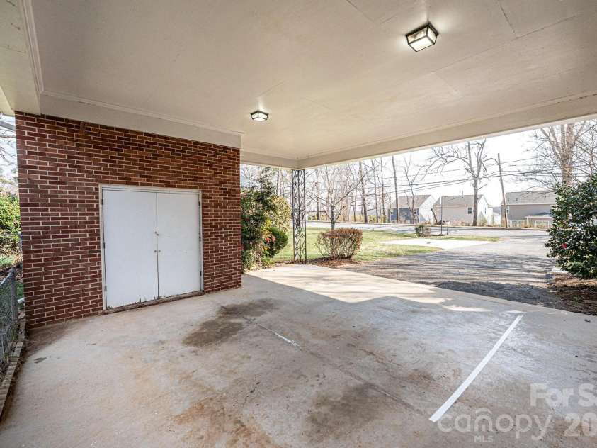 1425 5th Street, Hickory, NC 28601.  MLS# CAR4351835, YatesRealty ID 20337. Storage Room at Carport