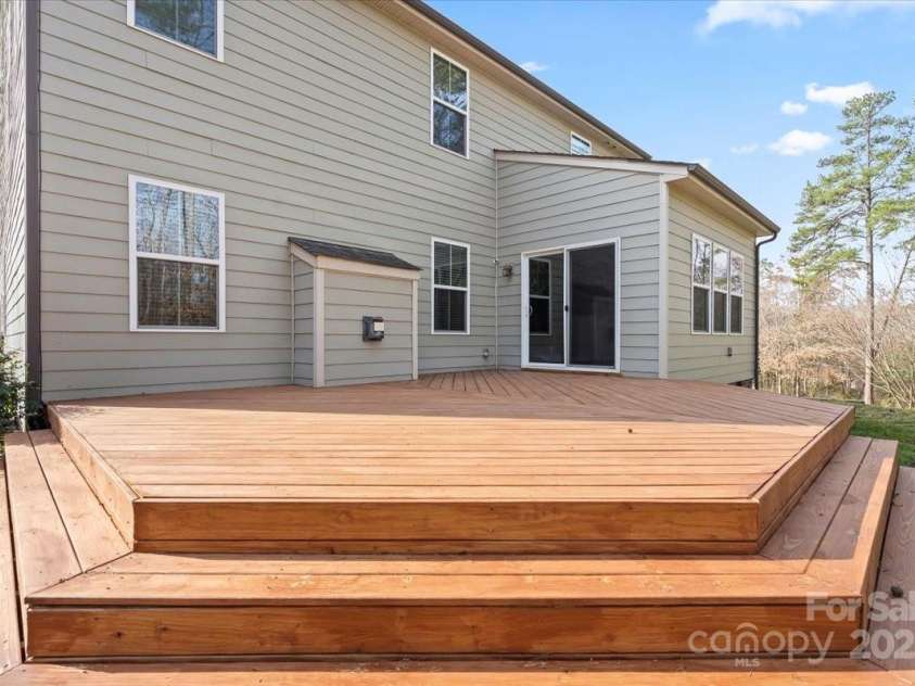 4095 Harmattan Drive, Denver, NC 28037.  MLS# CAR4259447, YatesRealty ID 20338. A deck built to entertain!