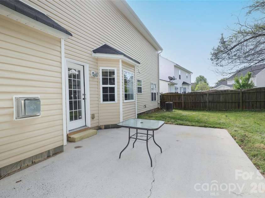 10910 Elm Bend Drive, Charlotte, NC 28273.  MLS# CAR4337592, YatesRealty ID 20339. Large patio with privacy fencing around the backyard.
