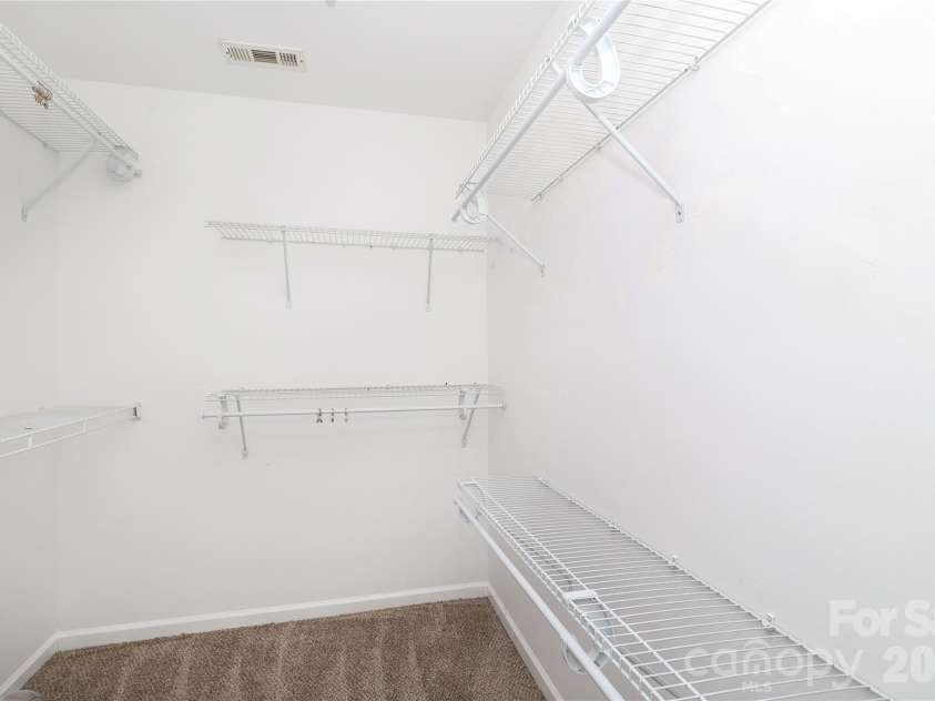 10910 Elm Bend Drive, Charlotte, NC 28273.  MLS# CAR4337592, YatesRealty ID 20339. Owners walk in closet