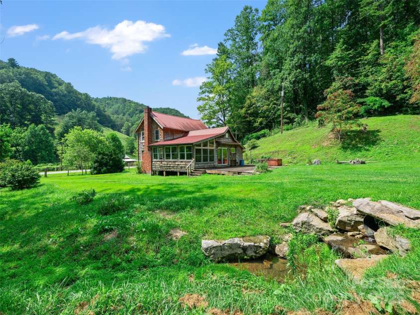 9065 NC 63 Highway, Leicester, NC 28748.  MLS# CAR4286038, YatesRealty ID 2034. 1910 Farmhouse