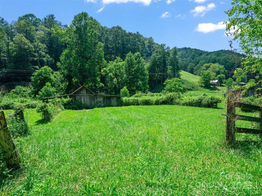 9065 NC 63 Highway, Leicester, NC 28748.  MLS# CAR4286038, YatesRealty ID 2034. 