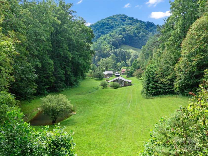 9065 NC 63 Highway, Leicester, NC 28748.  MLS# CAR4286038, YatesRealty ID 2034. 