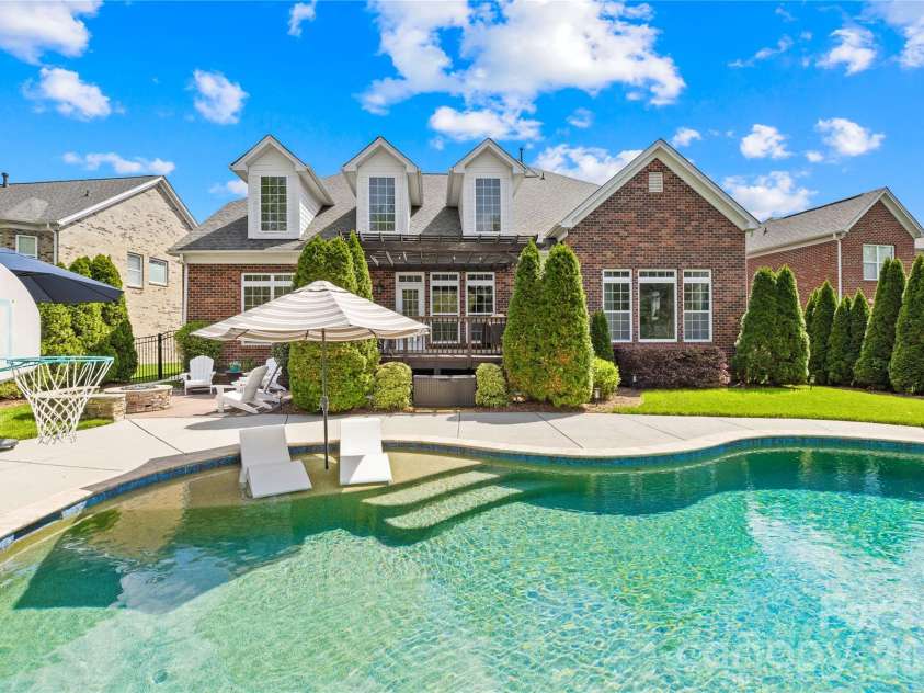 8416 Fairgreen Avenue, Waxhaw, NC 28173.  MLS# CAR4367125, YatesRealty ID 20341. Salt water gunite pool