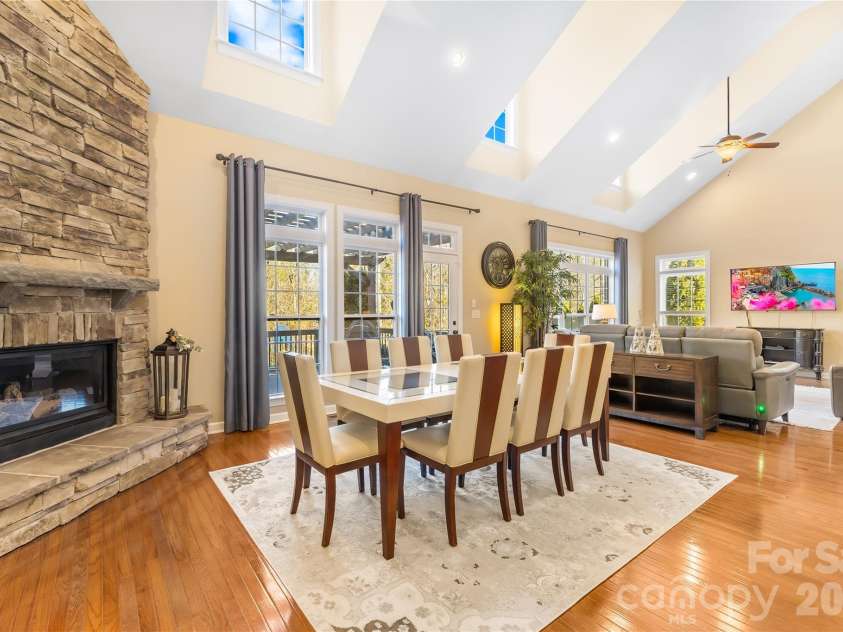 8416 Fairgreen Avenue, Waxhaw, NC 28173.  MLS# CAR4367125, YatesRealty ID 20341. Stacked stone fireplace in dining area