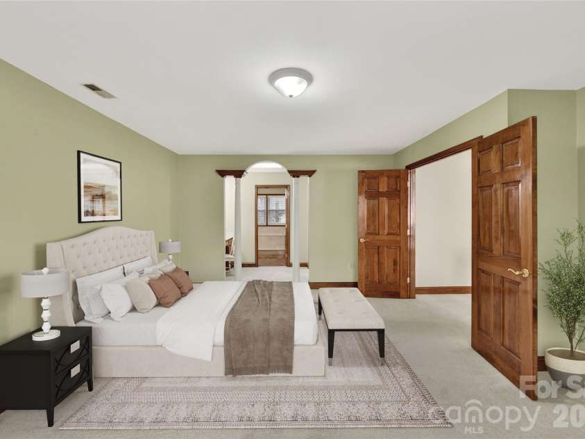 3100 Shady Grove Lane, Matthews, NC 28104.  MLS# CAR4355389, YatesRealty ID 20351. Virtually staged primary bedrom