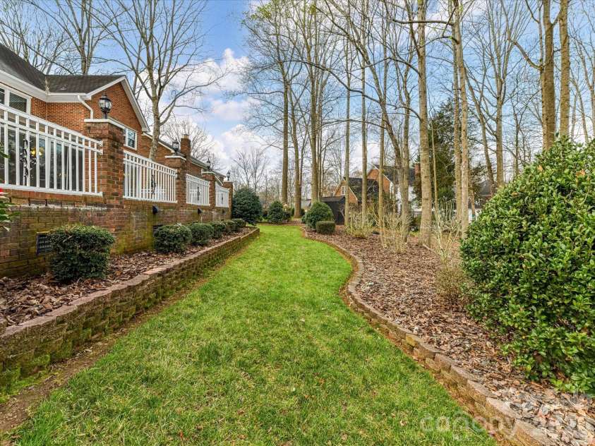 3100 Shady Grove Lane, Matthews, NC 28104.  MLS# CAR4355389, YatesRealty ID 20351. Virtually Staged Screen Porch