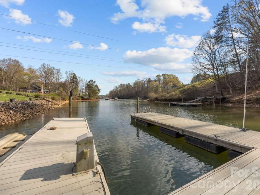 307 Stillwater Road, Troutman, NC 28166.  MLS# CAR4360560, YatesRealty ID 20352. Custom dock