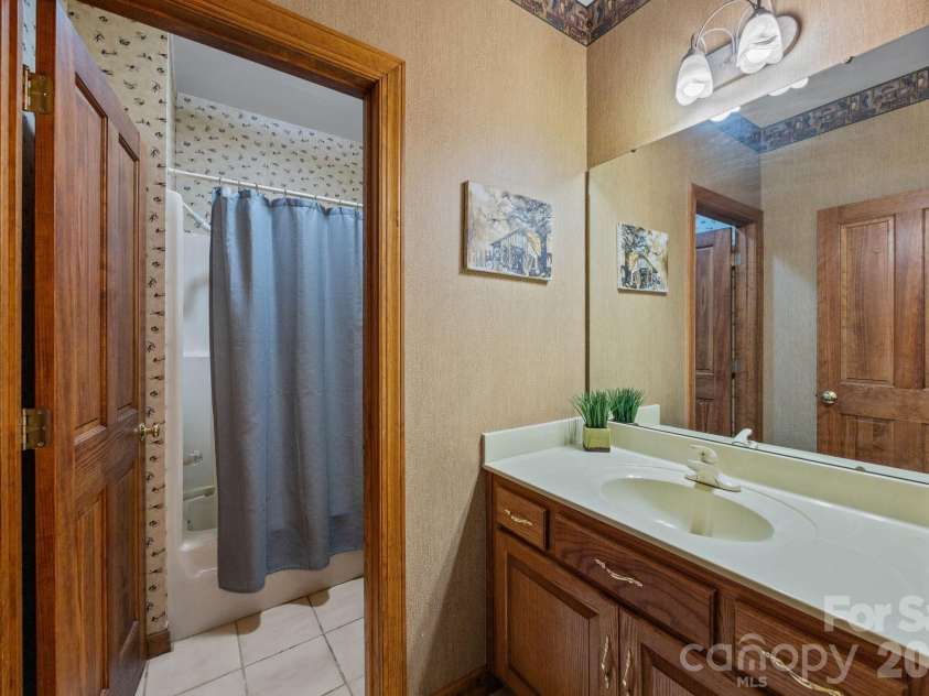 307 Stillwater Road, Troutman, NC 28166.  MLS# CAR4360560, YatesRealty ID 20352. Lower level full bath