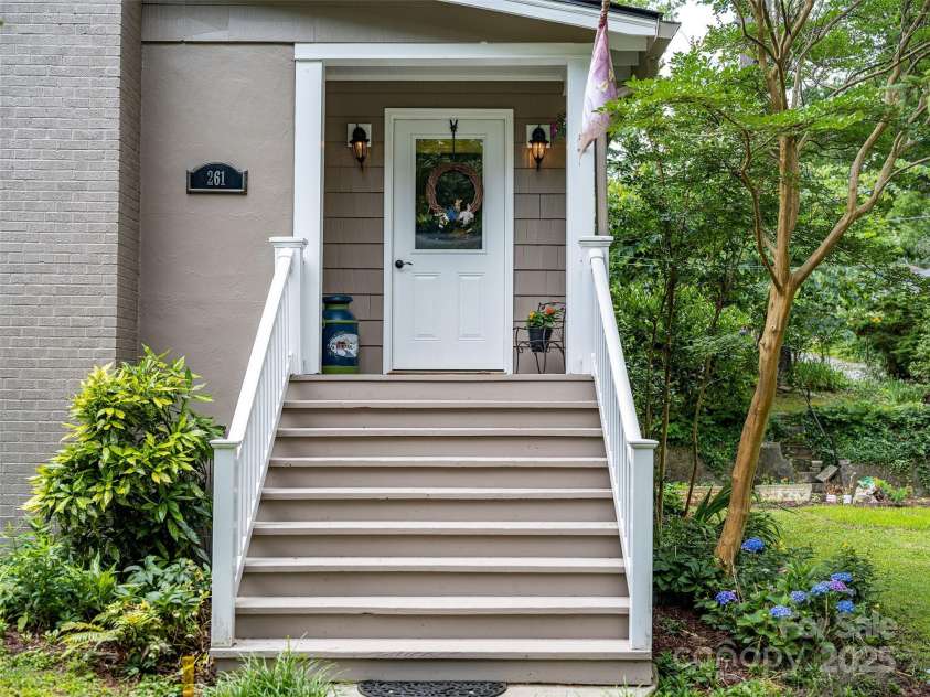 261 Forest Hill Drive, Asheville, NC 28803.  MLS# CAR4269408, YatesRealty ID 20353. Garden shed for outdoor storage.