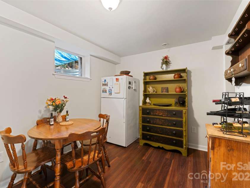 261 Forest Hill Drive, Asheville, NC 28803.  MLS# CAR4269408, YatesRealty ID 20353. Kitchen and dining space (lower level apt)