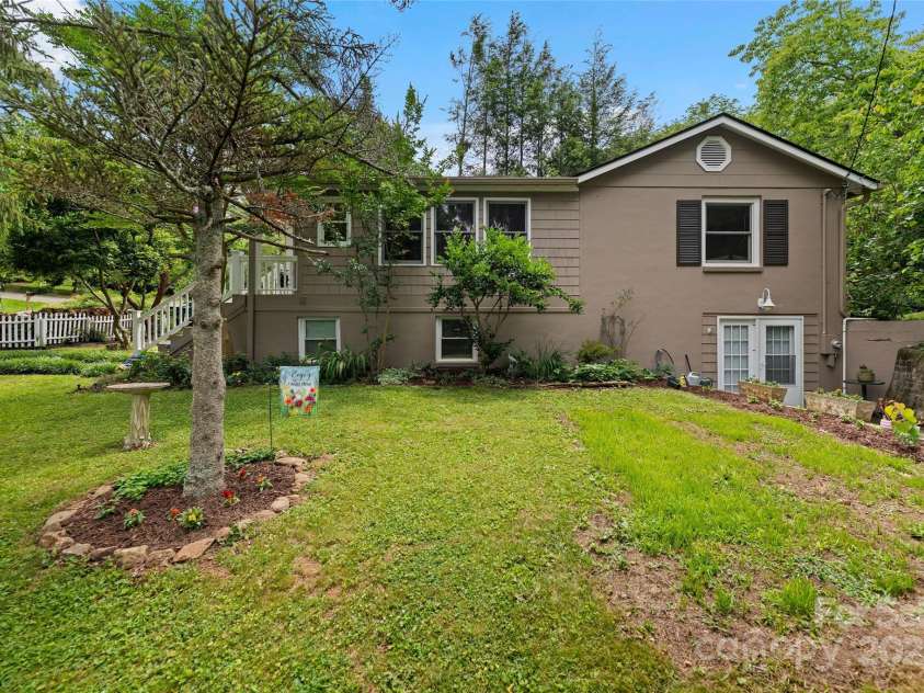 261 Forest Hill Drive, Asheville, NC 28803.  MLS# CAR4269408, YatesRealty ID 20353. Side of house with lower level entrance (no steps)