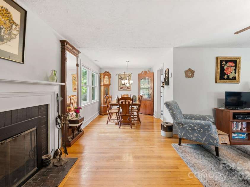 261 Forest Hill Drive, Asheville, NC 28803.  MLS# CAR4269408, YatesRealty ID 20353. View from living room into dining area
