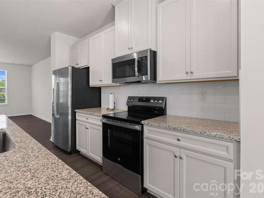 1409 May Apple Drive, Matthews, NC 28104.  MLS# CAR4375083, YatesRealty ID 20354. 