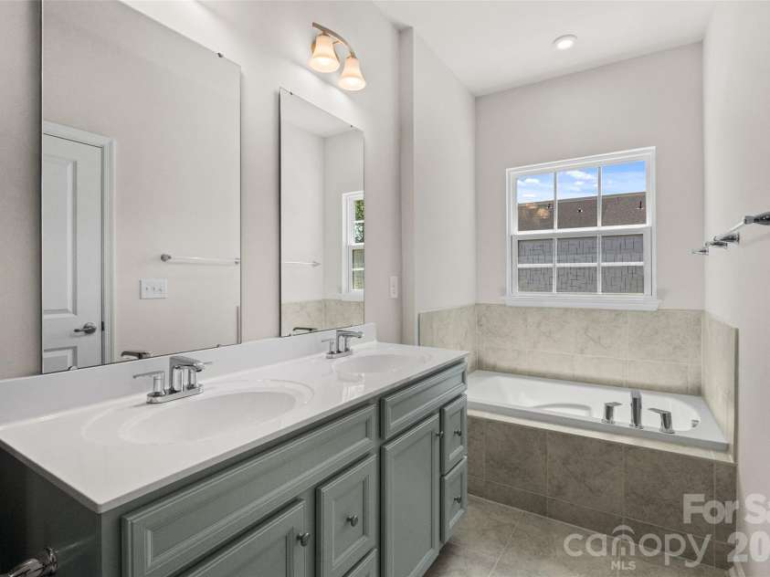 1409 May Apple Drive, Matthews, NC 28104.  MLS# CAR4375083, YatesRealty ID 20354. 