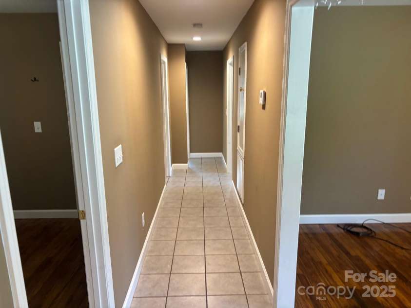 907 McGowan Road, Shelby, NC 28150.  MLS# CAR4251957, YatesRealty ID 20359. Hall with tile floors