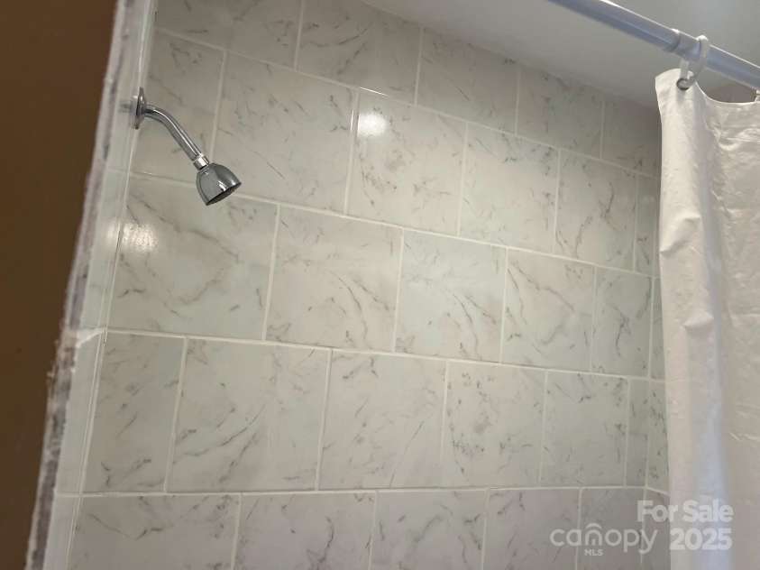 907 McGowan Road, Shelby, NC 28150.  MLS# CAR4251957, YatesRealty ID 20359. New tile in the tub/shower