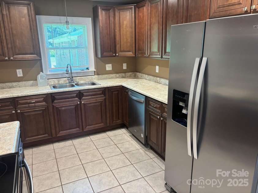 907 McGowan Road, Shelby, NC 28150.  MLS# CAR4251957, YatesRealty ID 20359. Stainless steel refrigerator remains