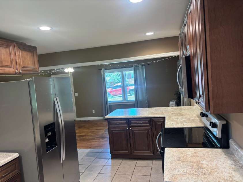 907 McGowan Road, Shelby, NC 28150.  MLS# CAR4251957, YatesRealty ID 20359. View toward living room