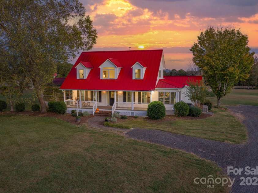 1260 Beaver Island Trail Road, Walnut Cove, NC 27052.  MLS# CAR4325171, YatesRealty ID 2036. Custom built farm house w/ extensive renovations (2020-2021)