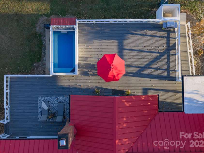 1260 Beaver Island Trail Road, Walnut Cove, NC 27052.  MLS# CAR4325171, YatesRealty ID 2036. Expansive deck overlooking back pasture and ponds