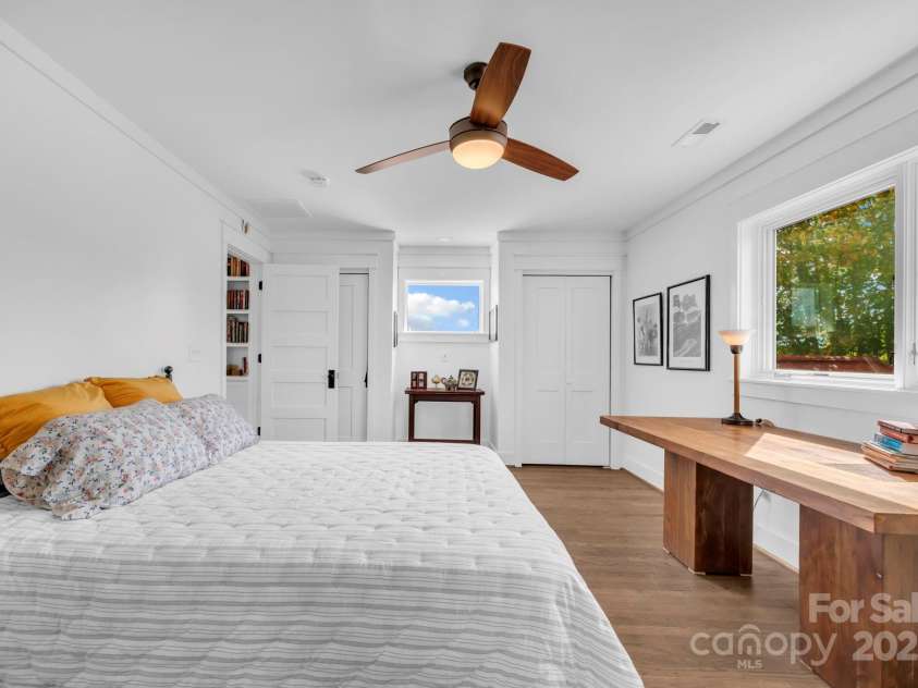 1260 Beaver Island Trail Road, Walnut Cove, NC 27052.  MLS# CAR4325171, YatesRealty ID 2036. Guest bedroom w/ ceiling fan and access to nook overlooking foyer