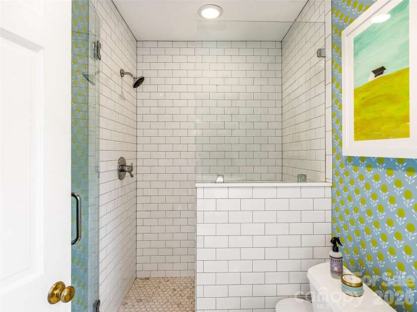 10 Kalimar Heights, Hendersonville, NC 28739.  MLS# CAR4376746, YatesRealty ID 20362. One of the three full bathrooms on the second level. 